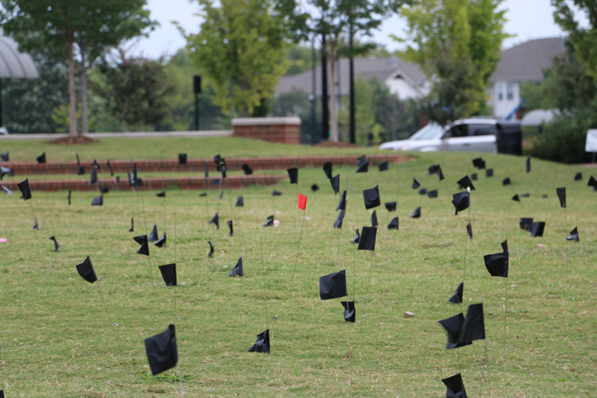 Student Organization Raises Suicide Awareness by Planting Flags