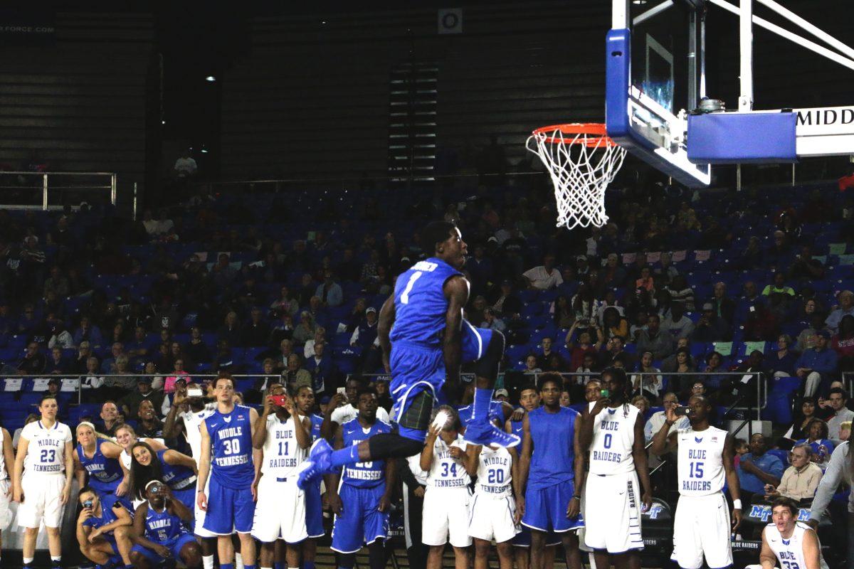 DJ Jones competes in dunking competition. Photo by RJ Estrella MTSU Sidelines Staff Photographer.