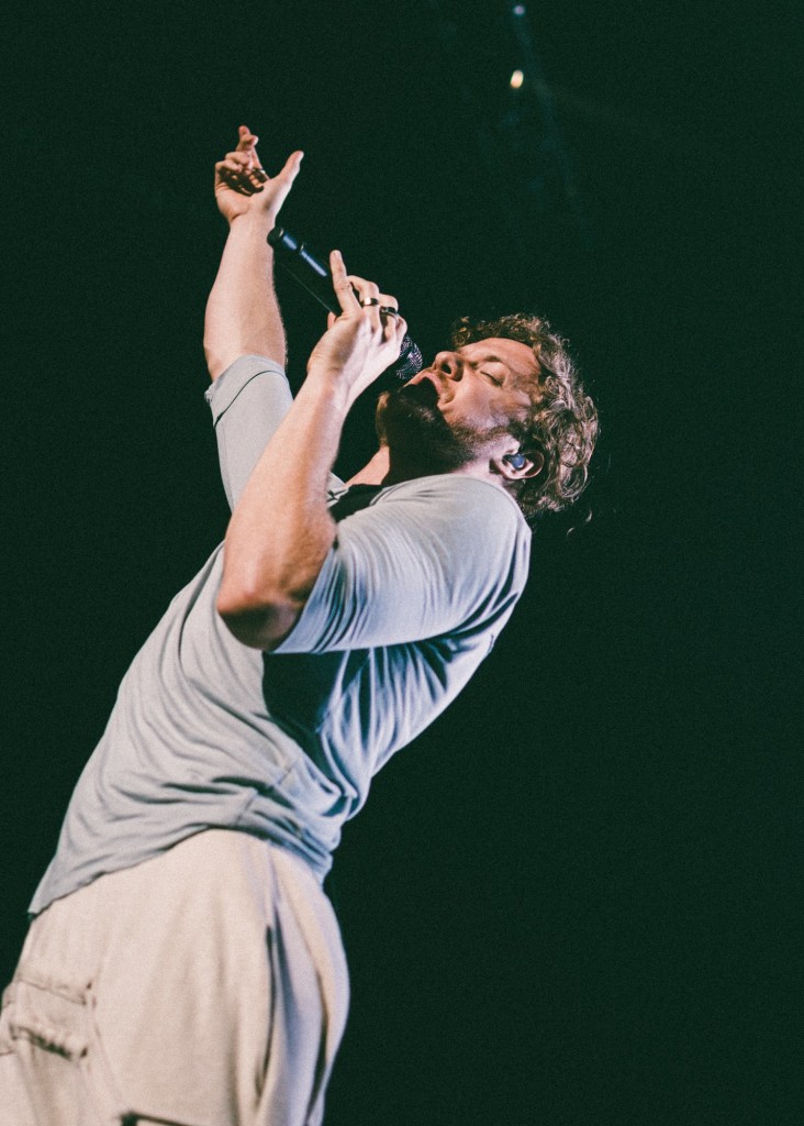 Dan Reynolds of Imagine Dragons performs at Bridgestone Arena in Nashville, Tenn. on Wednesday, June 8, 2015, The performance was part of the band's "Smoke + Mirrors" tour. (MTSU Sidelines / Andre Rowlett)