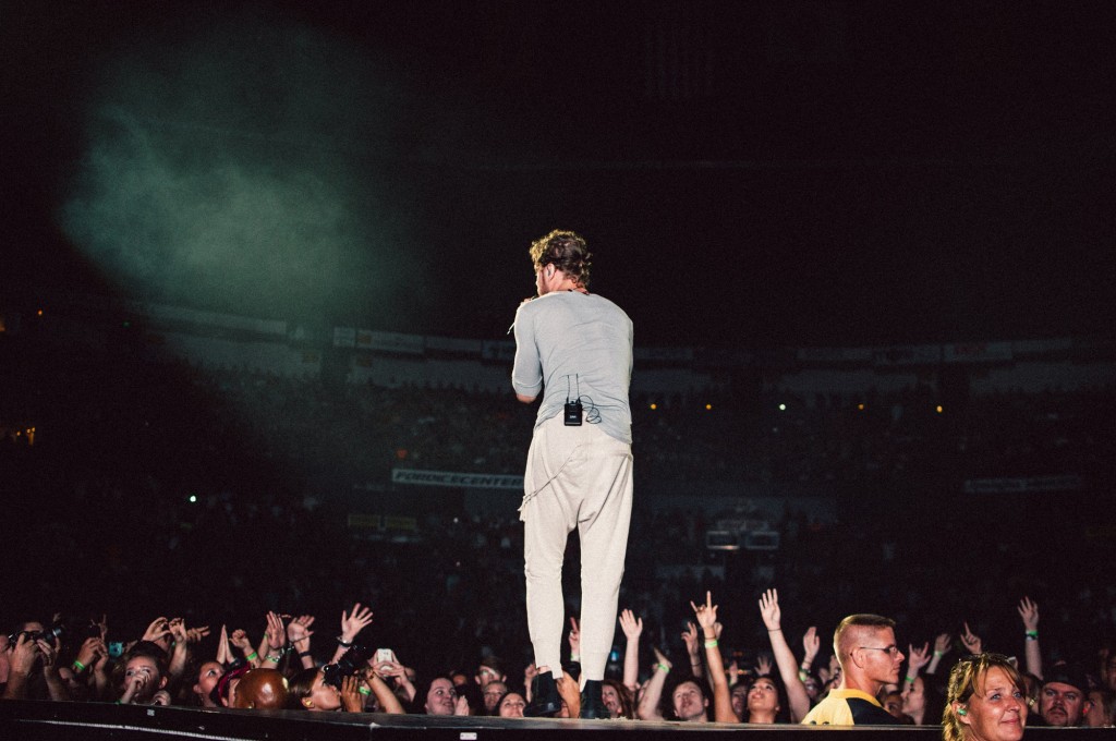 Dan Reynolds of Imagine Dragons performs at Bridgestone Arena in Nashville, Tenn. on Wednesday, June 8, 2015, The performance was part of the band's "Smoke + Mirrors" tour. (MTSU Sidelines / Andre Rowlett)