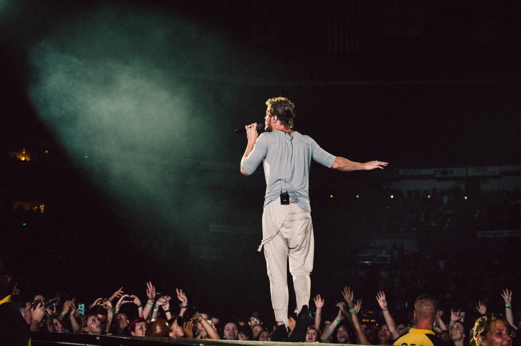 Dan Reynolds of Imagine Dragons performs at Bridgestone Arena in Nashville, Tenn. on Wednesday, June 8, 2015, The performance was part of the band's "Smoke + Mirrors" tour. (MTSU Sidelines / Andre Rowlett)