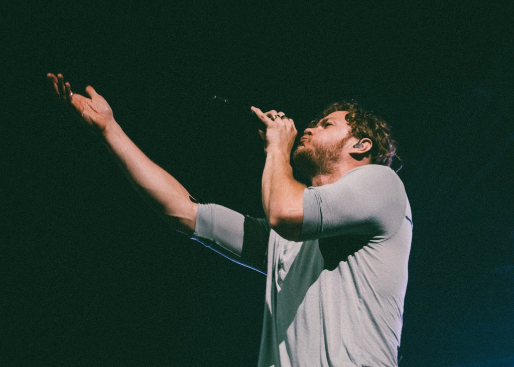 Dan Reynolds of Imagine Dragons performs at Bridgestone Arena in Nashville, Tenn. on Wednesday, June 8, 2015, The performance was part of the band's "Smoke + Mirrors" tour. (MTSU Sidelines / Andre Rowlett)