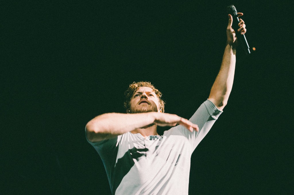 Dan Reynolds of Imagine Dragons performs at Bridgestone Arena in Nashville, Tenn. on Wednesday, June 8, 2015, The performance was part of the band's "Smoke + Mirrors" tour. (MTSU Sidelines / Andre Rowlett)