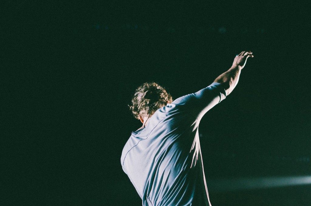 Dan Reynolds of Imagine Dragons performs at Bridgestone Arena in Nashville, Tenn. on Wednesday, June 8, 2015, The performance was part of the band's "Smoke + Mirrors" tour. (MTSU Sidelines / Andre Rowlett)