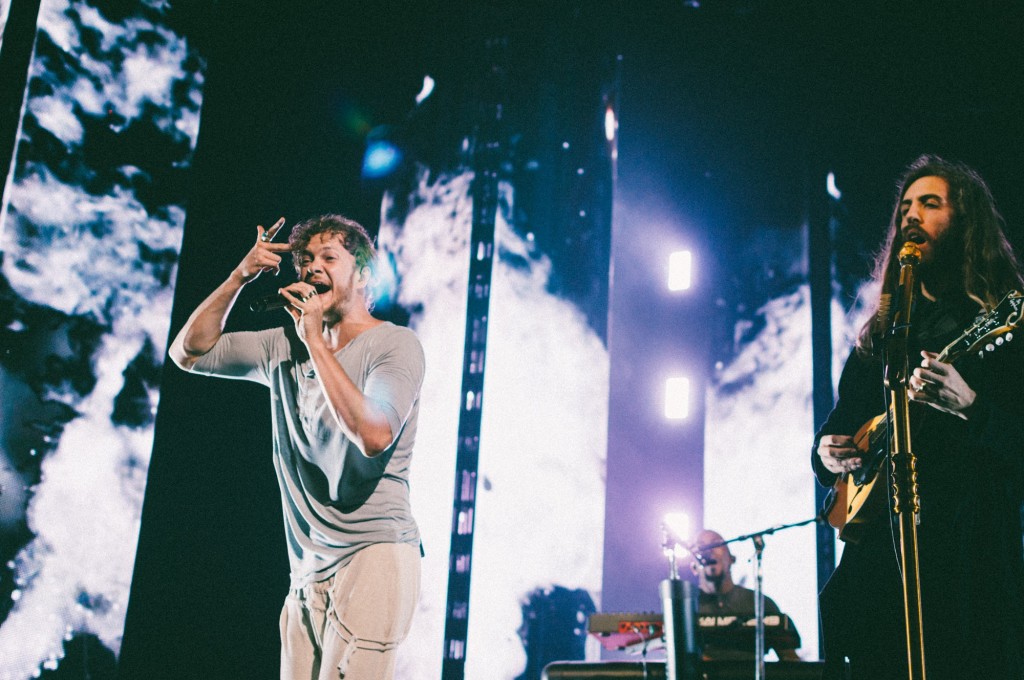 Dan Reynolds, left, and Wayne Sermon, right, of Imagine Dragons performs at Bridgestone Arena in Nashville, Tenn. on Wednesday, June 8, 2015, The performance was part of the band's "Smoke + Mirrors" tour. (MTSU Sidelines / Andre Rowlett)