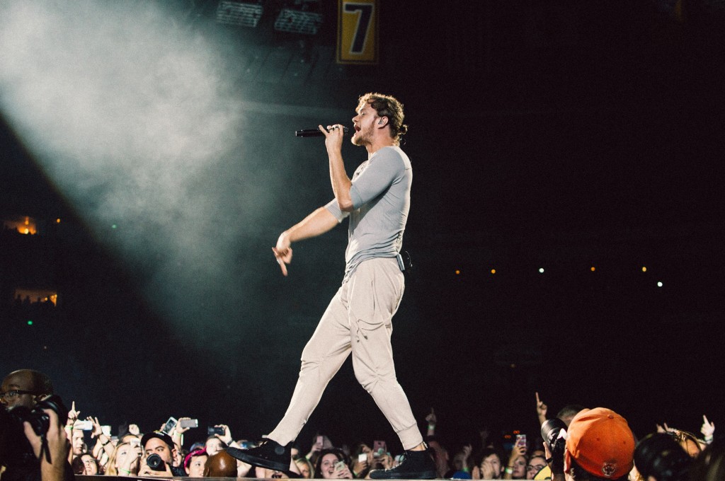 Dan Reynolds of Imagine Dragons performs at Bridgestone Arena in Nashville, Tenn. on Wednesday, June 8, 2015, The performance was part of the band's "Smoke + Mirrors" tour. (MTSU Sidelines / Andre Rowlett)