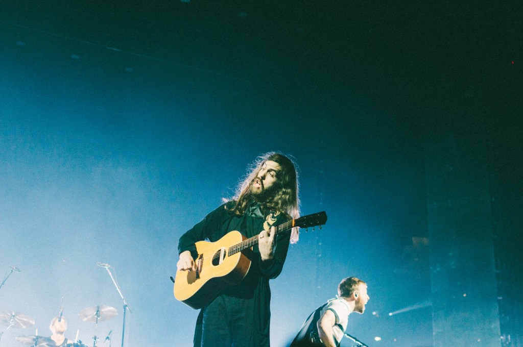 Wayne Sermon of Imagine Dragons performs at Bridgestone Arena in Nashville, Tenn. on Wednesday, June 8, 2015, The performance was part of the band's "Smoke + Mirrors" tour. (MTSU Sidelines / Andre Rowlett)