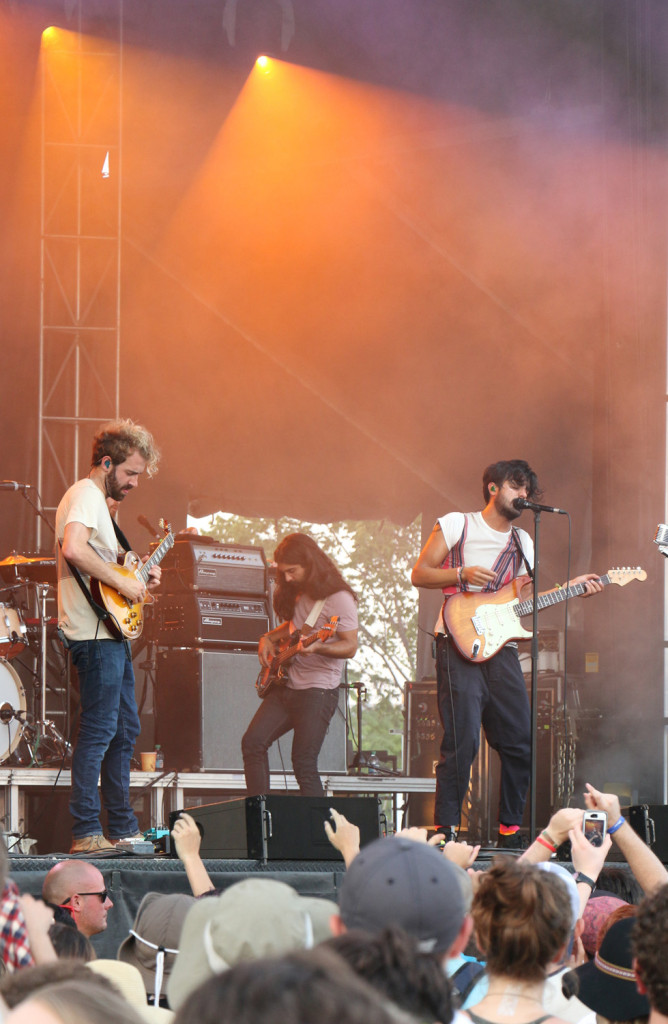 Jacob Tilley, left, Payam Doostzadeh, center, and Sameer Gadhia, right, of Young the Giant perform at the Sloss Music & Arts Festival in Birmingham, Ala., on Saturday, July 18, 2015. (MTSU Sidelines / John Connor Coulston)