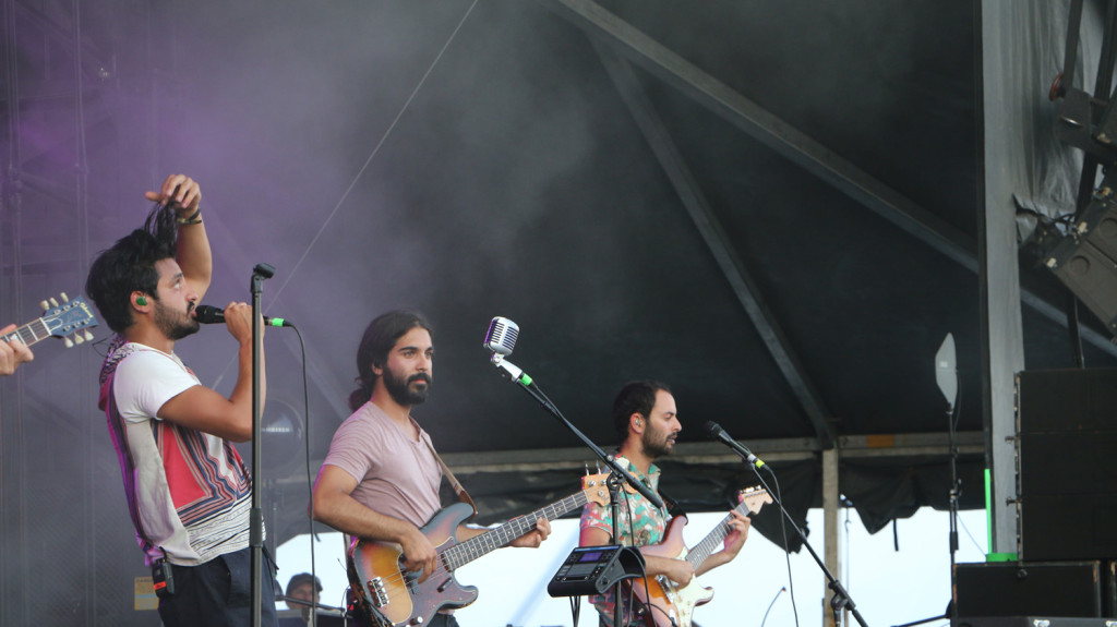 Sameer Gadhia, left, Payam Doostzadeh, center, and Eric Cannata, right, of Young the Giant perform at the Sloss Music & Arts Festival in Birmingham, Ala., on Saturday, July 18, 2015. (MTSU Sidelines / John Connor Coulston)