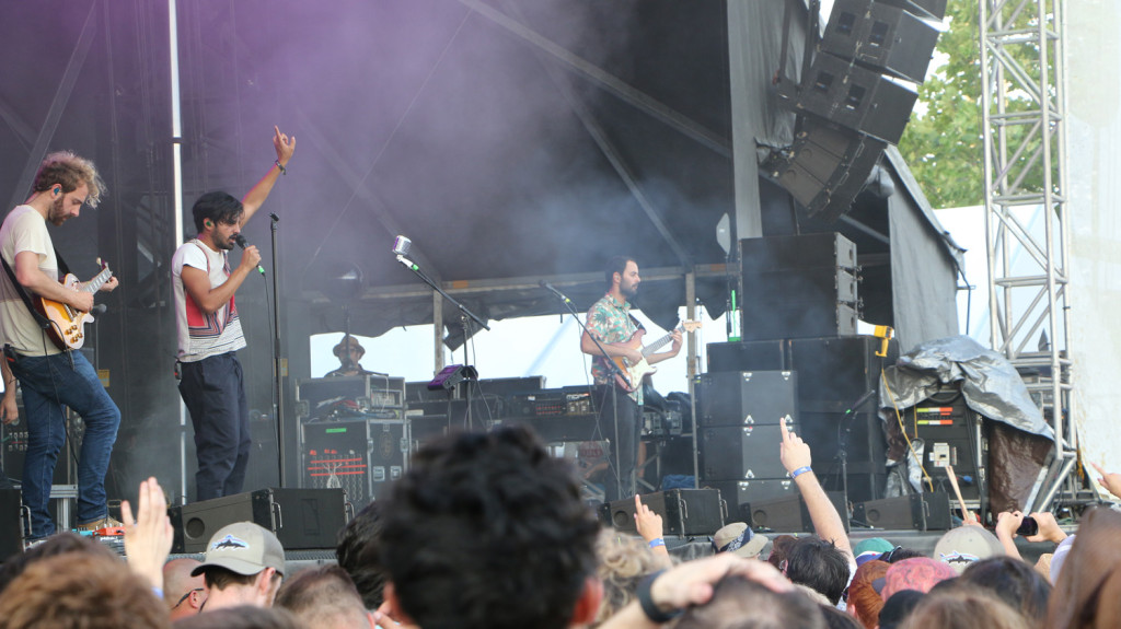Jacob Tilley, left, Sameer Gadhia, center, and Eric Cannata, right, of Young the Giant perform at the Sloss Music & Arts Festival in Birmingham, Ala., on Saturday, July 18, 2015. (MTSU Sidelines / John Connor Coulston)