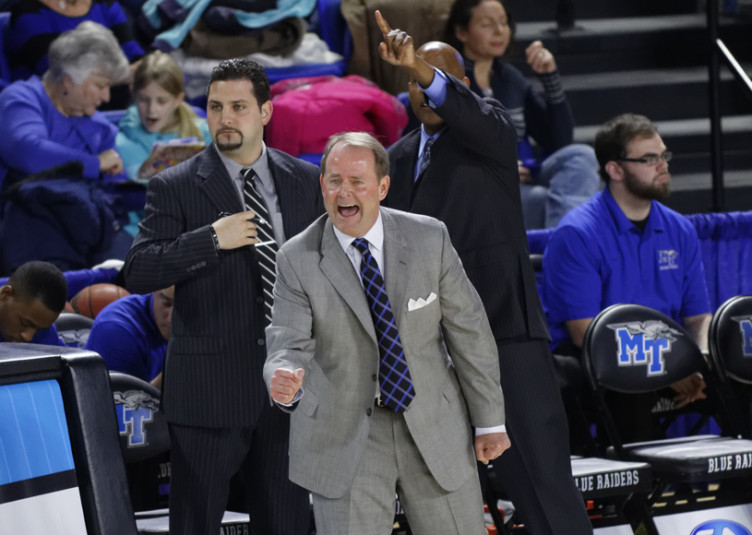 Head Coach Kermit Davis (center) said the team's victory on January 24 was due in part to the home crowd in Murphy Center. (Greg French/MTSU Sidelines)