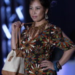 Luz Vasquez Carlton models during the "Dressed to Give Fashion Affair" at Stones River Country Club in Murfreesboro, Tenn. on Saturday, Nov. 22, 2014. The event was a fundraiser for Helping Hands Worldwide Services. (MTSU Sidelines/Greg French)