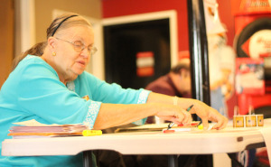 Election official Betty Cox at Bud's Tire Pros, Murfreesboro's smallest precinct voting location. Photo by Samantha Hearn. 