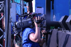 MTSU student workers gather behind the university’s Mobile Production Lab parked alongside the Who Stage at this year’s Bonnaroo Music and Arts Festival. (Photo: Dylan Skye Aycock / MTSU Seigenthaler News Service)