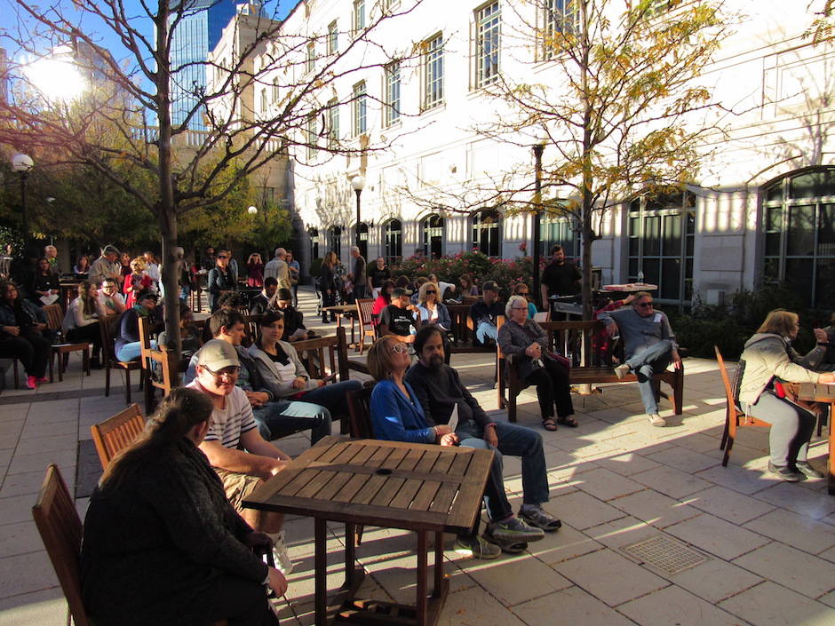 People gather in front of the courtyard stage outside the Schermerhorn Symphony Center in Nashville, Tenn. on Saturday, Oct. 22.