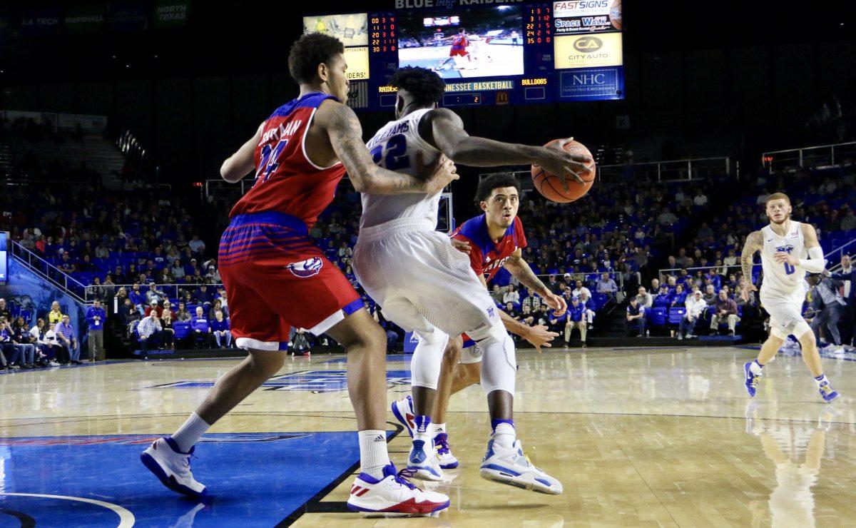 JaCorey Williams backing down a defender during a game against Louisiana Tech on Jan. 29, 2017. (Photo by Tyler Lamb/Sports Editor)