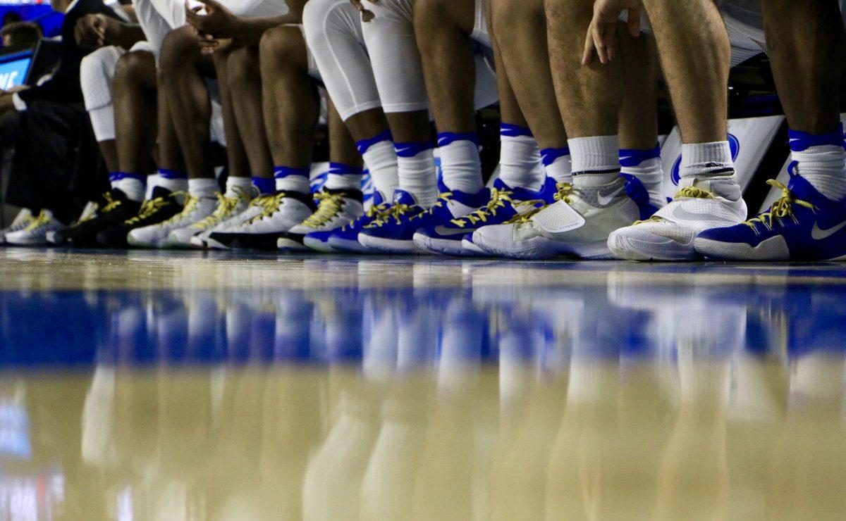 The entire team wore neon laces in support of "Lace up for Lacy" night on Jan. 29, 2017. (Photo by Tyler Lamb/ Sports Editor)