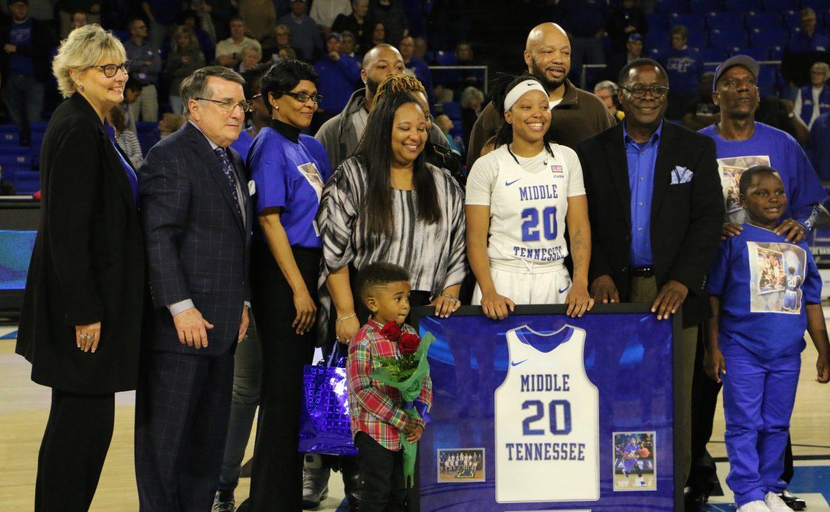 Ty Petty accompanied by her family, coach Insell, Associate Athletic Director Diane Turnham, and President Sidney McPhee during the senior day ceremony on Sunday, Feb. 26, 2017. (Devin P. Grimes/MTSU Sidelines) 