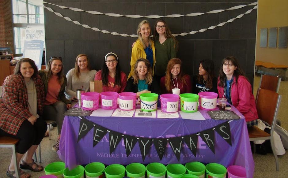 Member of Alpha Chi Omega sorority will be in the Student Union tabling all week for Penny Wars in support of Domestic Violence Awareness Week (Sidelines/Steve Barnum)