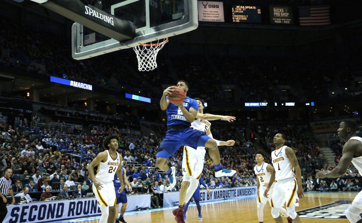 MTSU's Antwain Johnson hangs in the air for a basket during an NCAA Tournament first-round game against Minnesota in Milwaukee, WI on March 16, 2017. (MTSU Sidelines/Tyler Lamb)