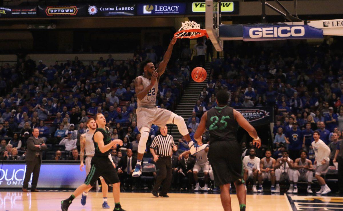 JaCorey Williams slams down an emphatic dunk to help the Blue Raiders defeat the Thundering Herd. (MTSU Sidelines/Tyler Lamb)