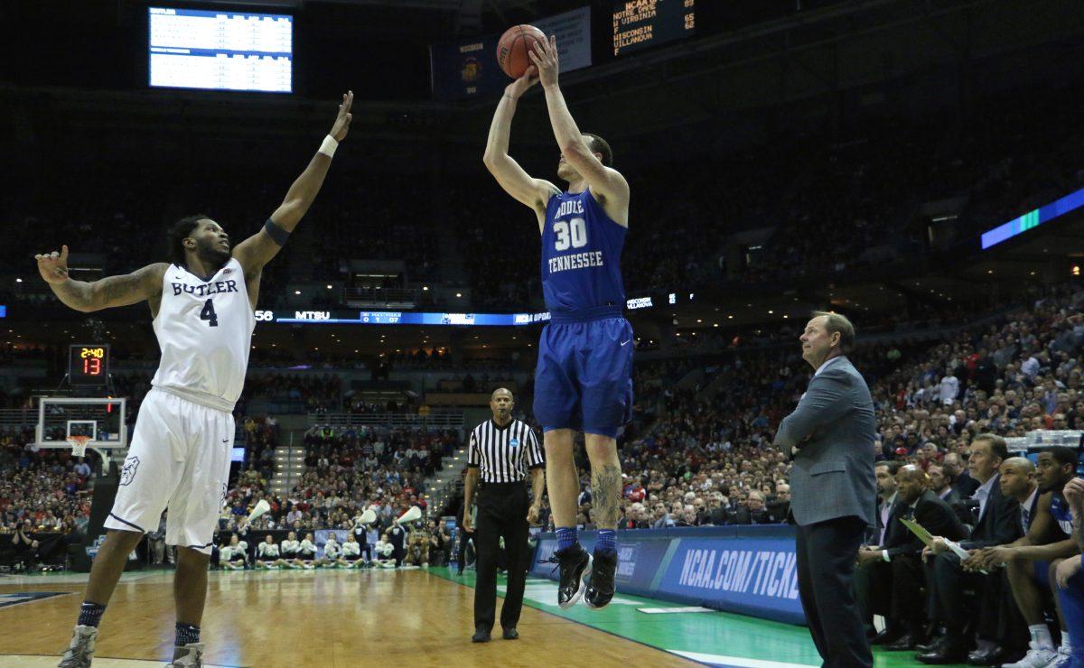 Reggie Upshaw (30) pulls a 3-pointer over Tyler Wideman (4) during an NCAA Tournament second-round game against Butler in Milwaukee, WI on March 19, 2017. (MTSU Sidelines/Tyler Lamb)