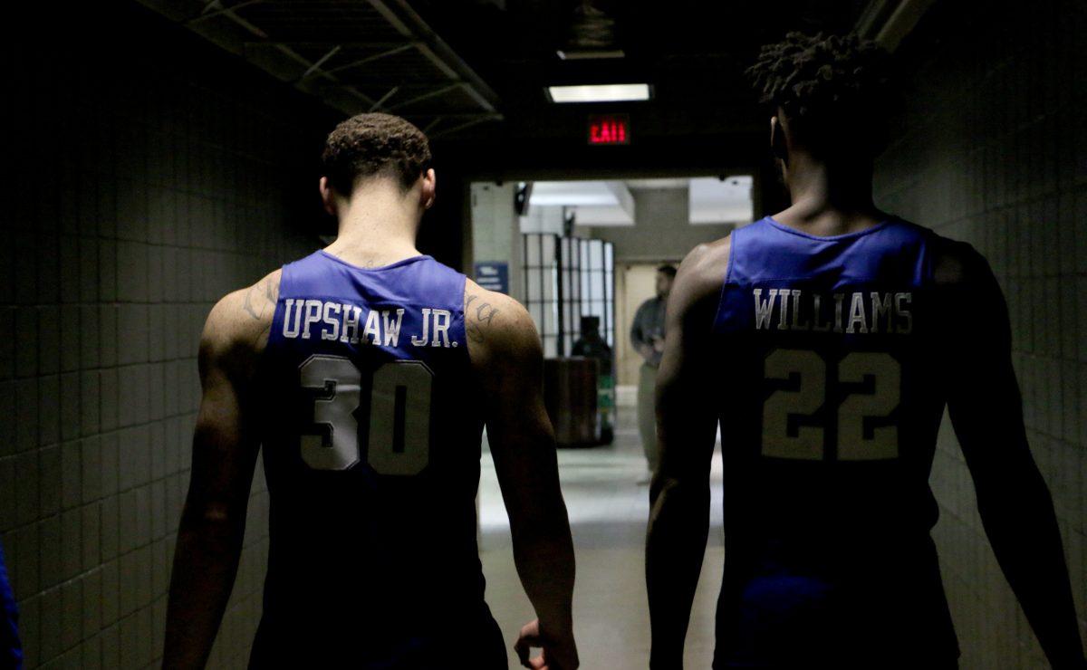 Reggie Upshaw (30) and JaCorey Williams (22) walk the hall to their locker room following an NCAA Tournament second-round game against Butler in Milwaukee, WI on March 19, 2017. (MTSU Sidelines/Tyler Lamb)