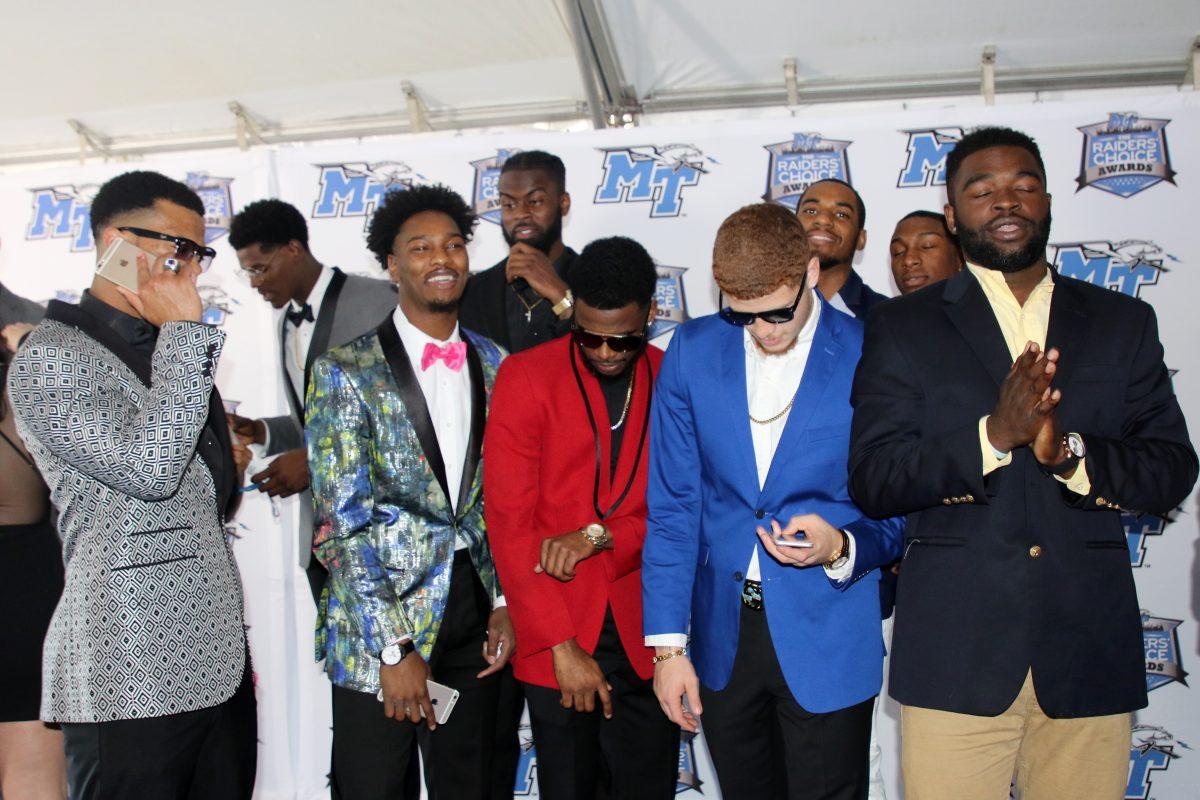 Members of the MTSU basketball team pose for a picture on the Blue Carpet at the Raiders' Choice Awards on Thursday, April 28, 2017. (MTSU Sidelines/Devin P. Grimes)