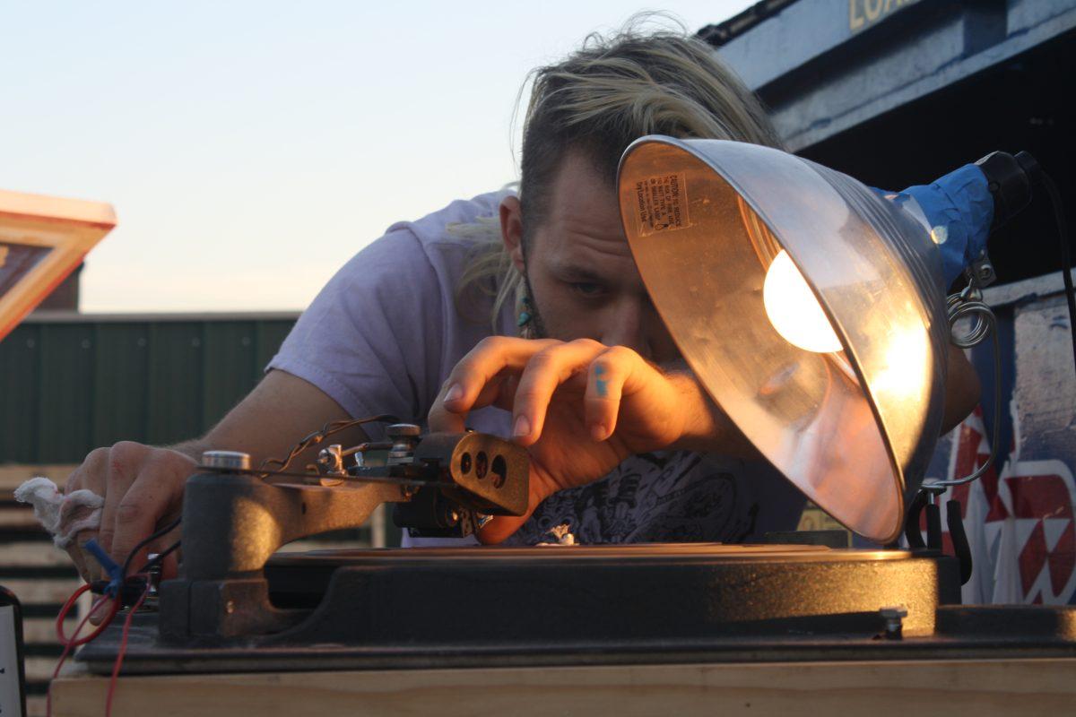 Ethan Rose cutting a record