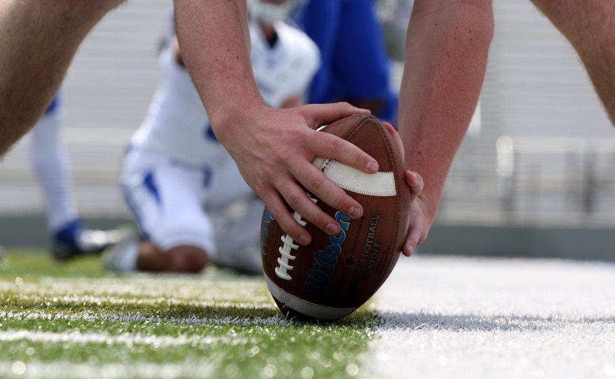 Daniel Sargent prepares to snap the ball to holder Kyle Banks during the Blue-White Spring Finale at Floyd Stadium on April 15, 2017. (MTSU Sidelines/Tyler Lamb)