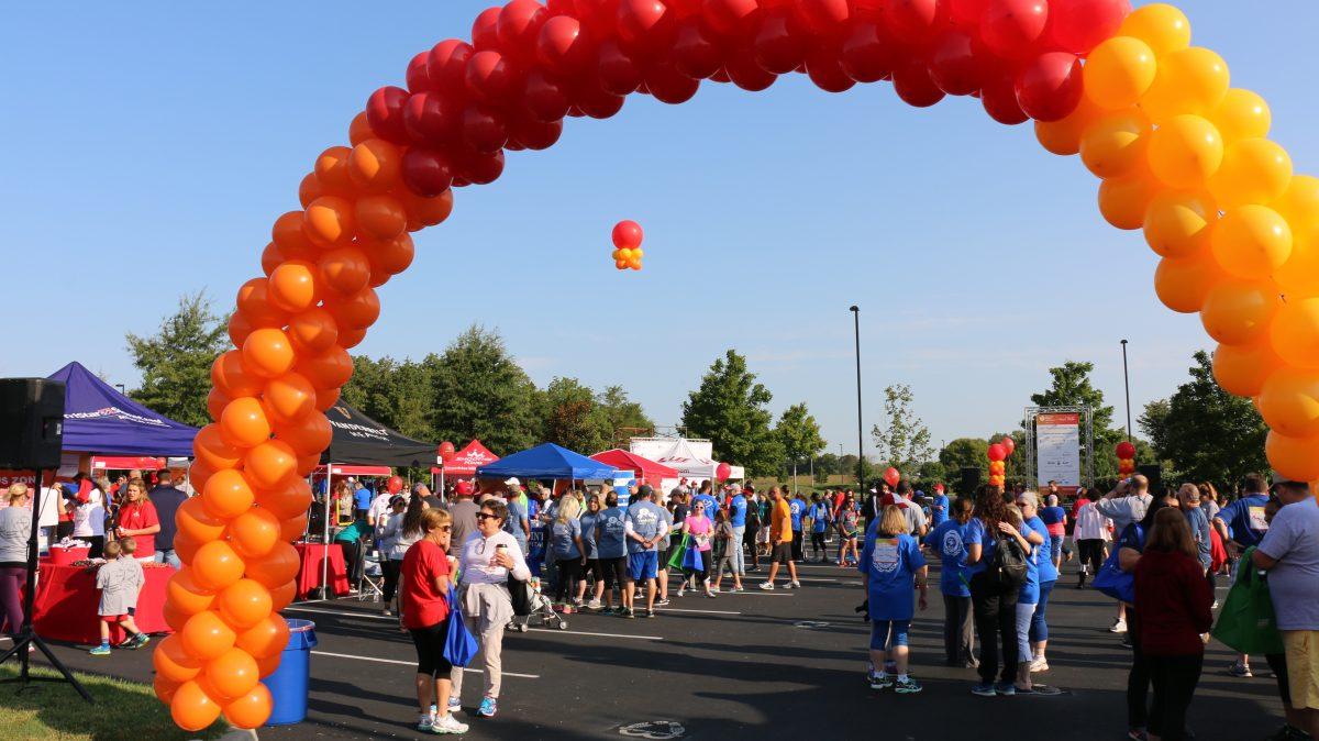 Visitors meet with one another and attend booths before the walk on Sept. 9, 2017. (Caleb Revill / MTSU Sidelines)