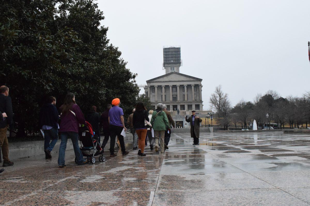 Demonstrators prepare before they walk into the capitol building to begin the rally. (Megan Cole / MTSU Sidelines) 