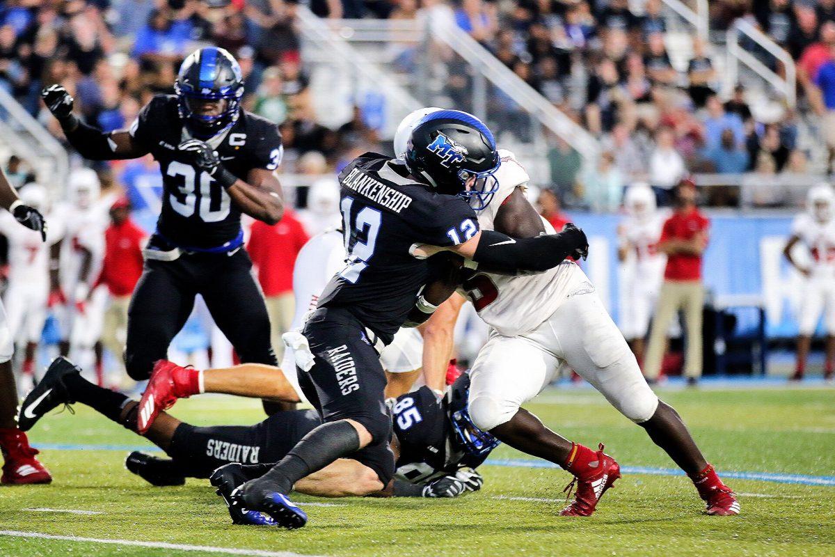 MTSU safety Reed Blankenship stuffs the Florida Atlantic running back short of the first down marker on Sep. 29, 2018, in Floyd Stadium. 