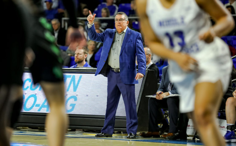 Women’s Basketball: Rick Insell hits milestone victory in defensive battle against North Texas