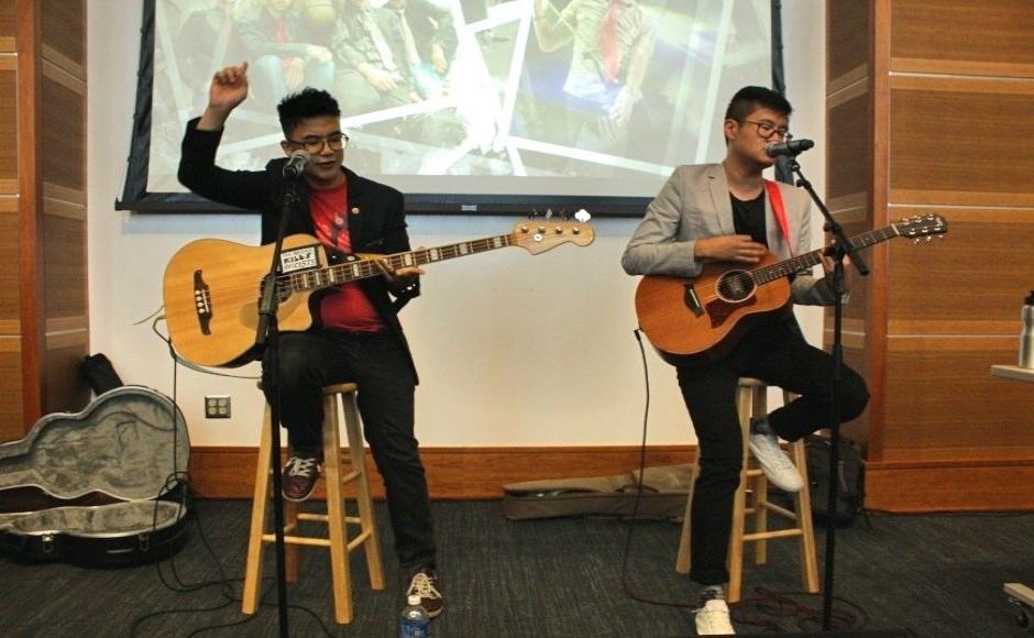 Simon Tam opens up "The Slants" lecture with an acoustic performance to set the tone for the evening. (Sydney Cohn / MTSU Sidelines)