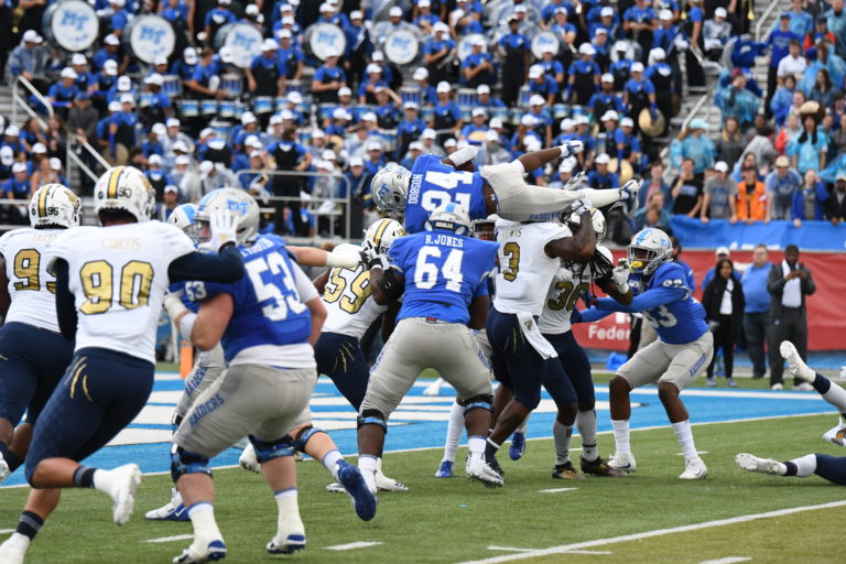 Football: Blue Raiders get wet and wild in Homecoming win over FIU 50-17