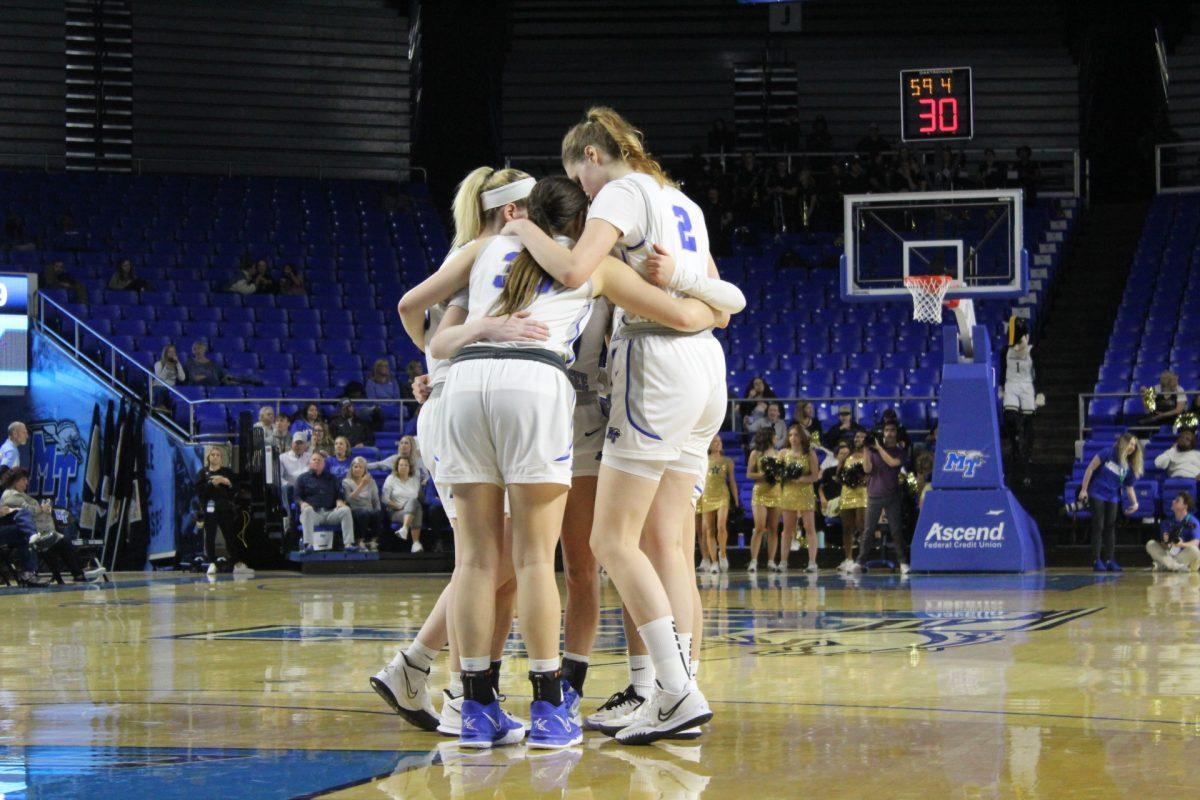 Lady Raiders huddle up during their game against Vanderbilt in the WNIT. (Calvin White / Sidelines)