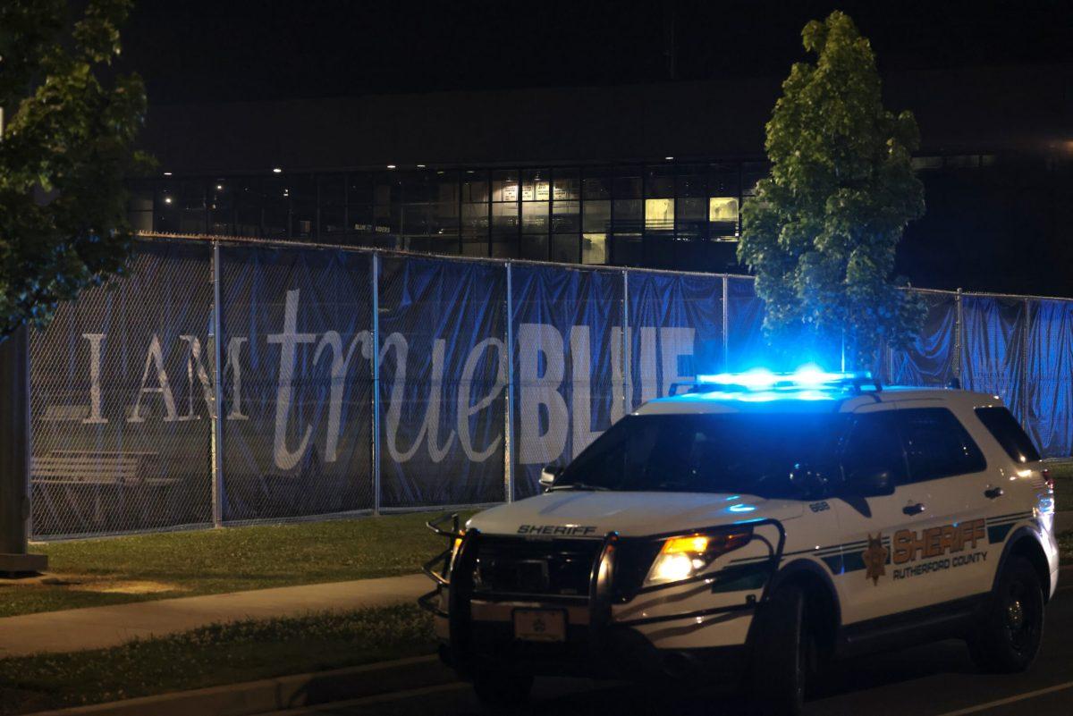 A Rutherford County Sheriff vehicle is parked at Middle Tennessee State University's campus the night of a shooting at Murphy Center. (Photo by Bill Lickman)