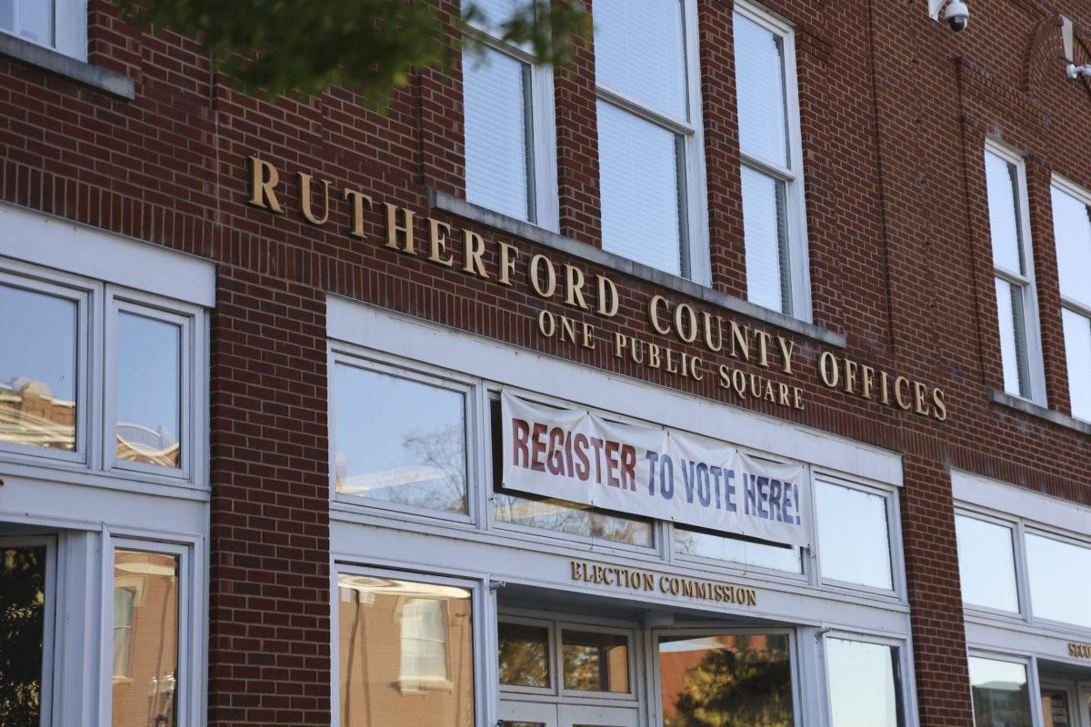 The election commission building hangs a sign to remind Rutherford County citizens to register to vote. (Photo by Makayla Sulcer)