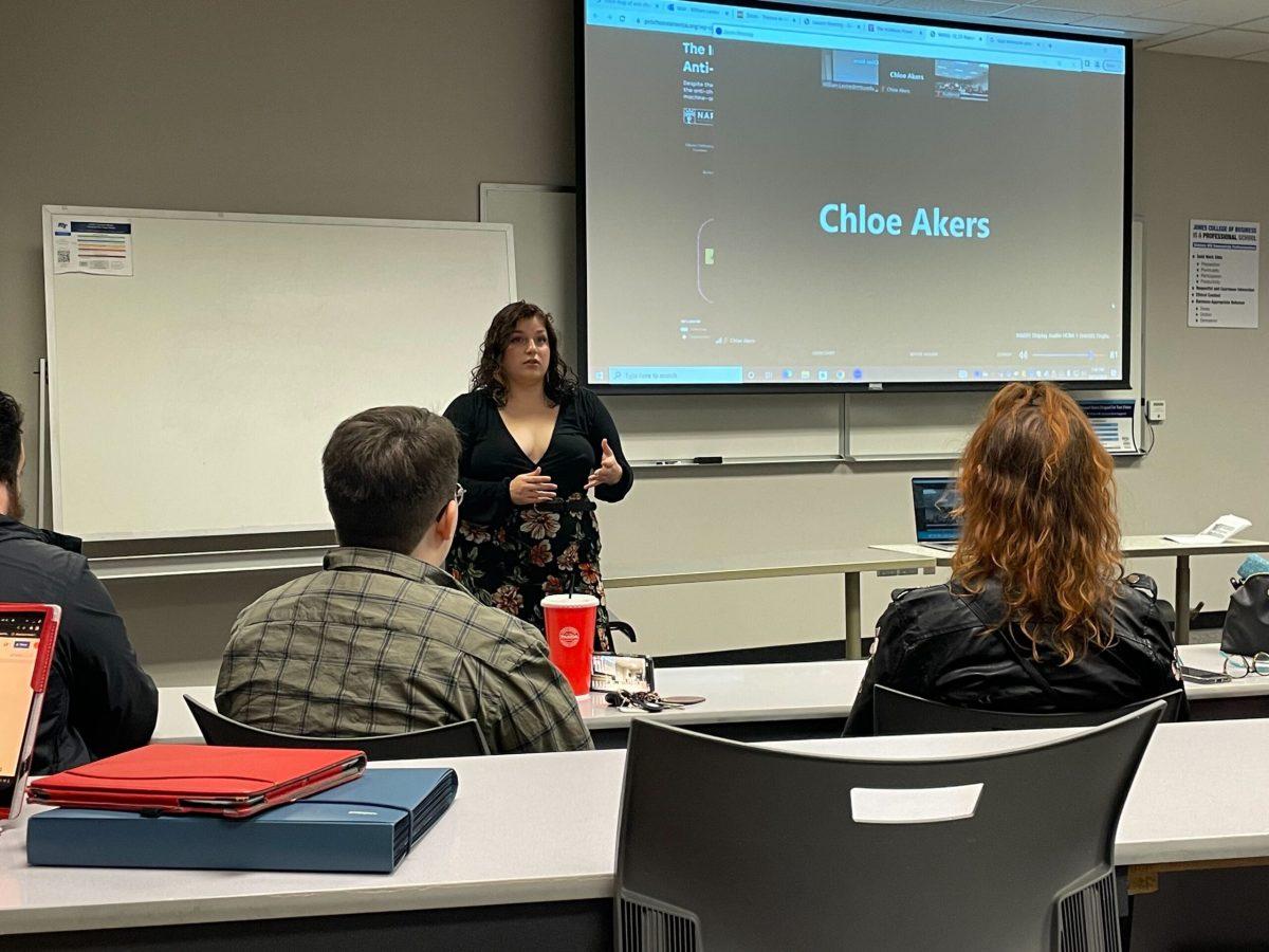 Chloe Akers (zoom) and Julie Edwards (in person) discuss the abortion ban in Tennessee with a group of MTSU students. Photo by Lillian Chapman.