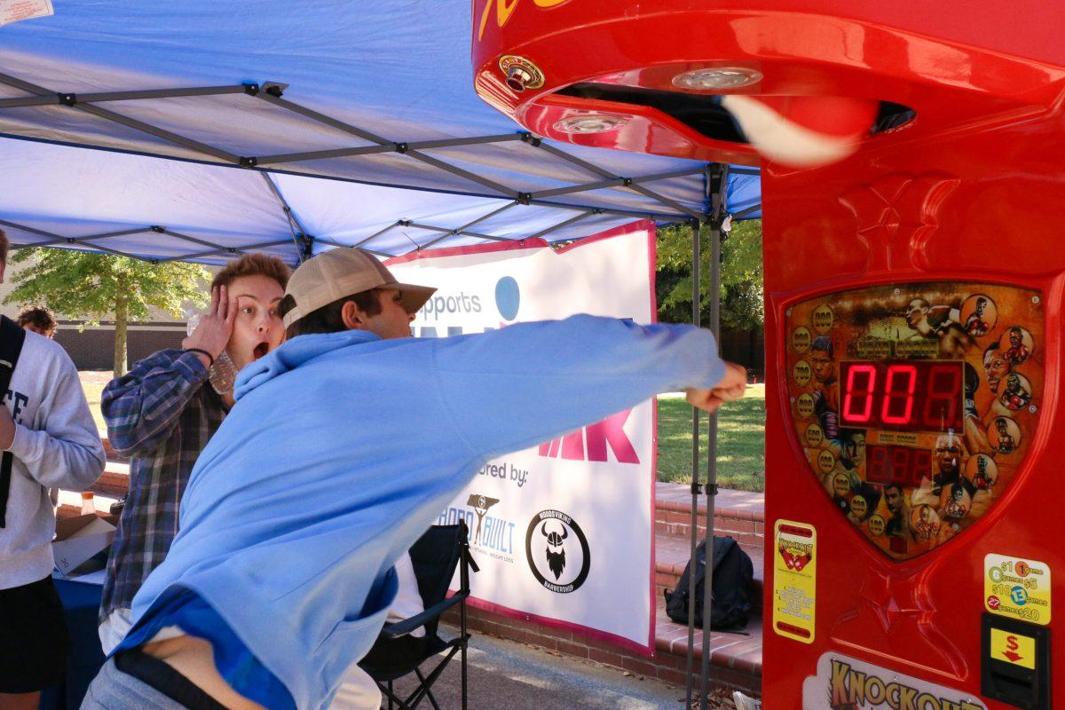 Bobby Ogg showing off his punching skills to raise money for breast cancer. (Photo by Aubrey Salm)