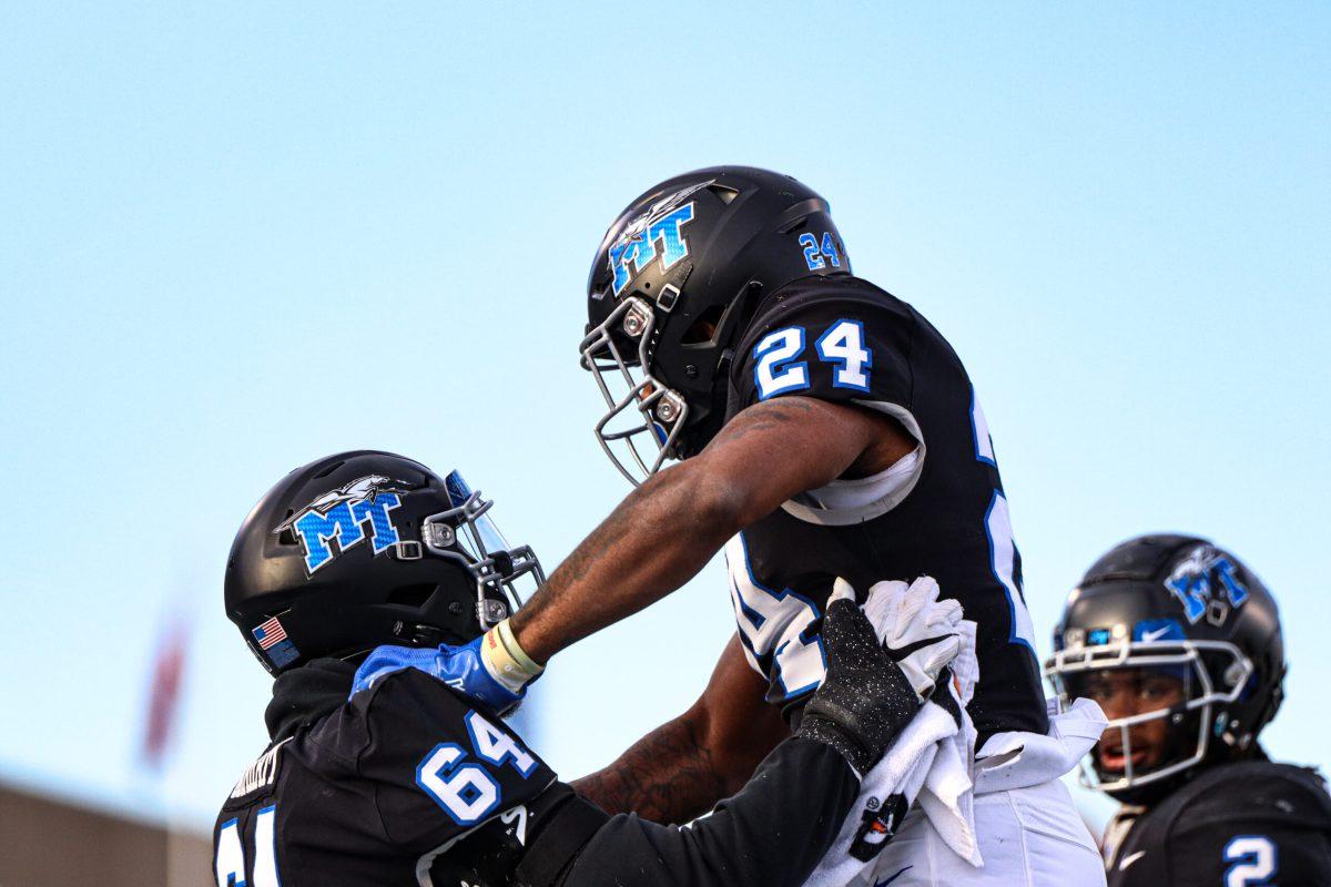 MTSU football celebrates after a touchdown. Photo by Lucas Larkin. 