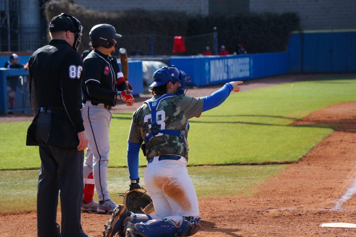 MTSU catcher Briggs Rutter prepares to catch the pitch. (Photo by Ryan Loftis)