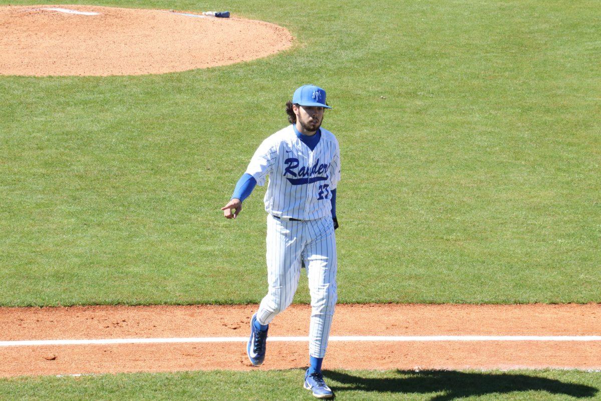 Jaden Hamm walks toward the dugout. (Photo by Ryan Loftis)