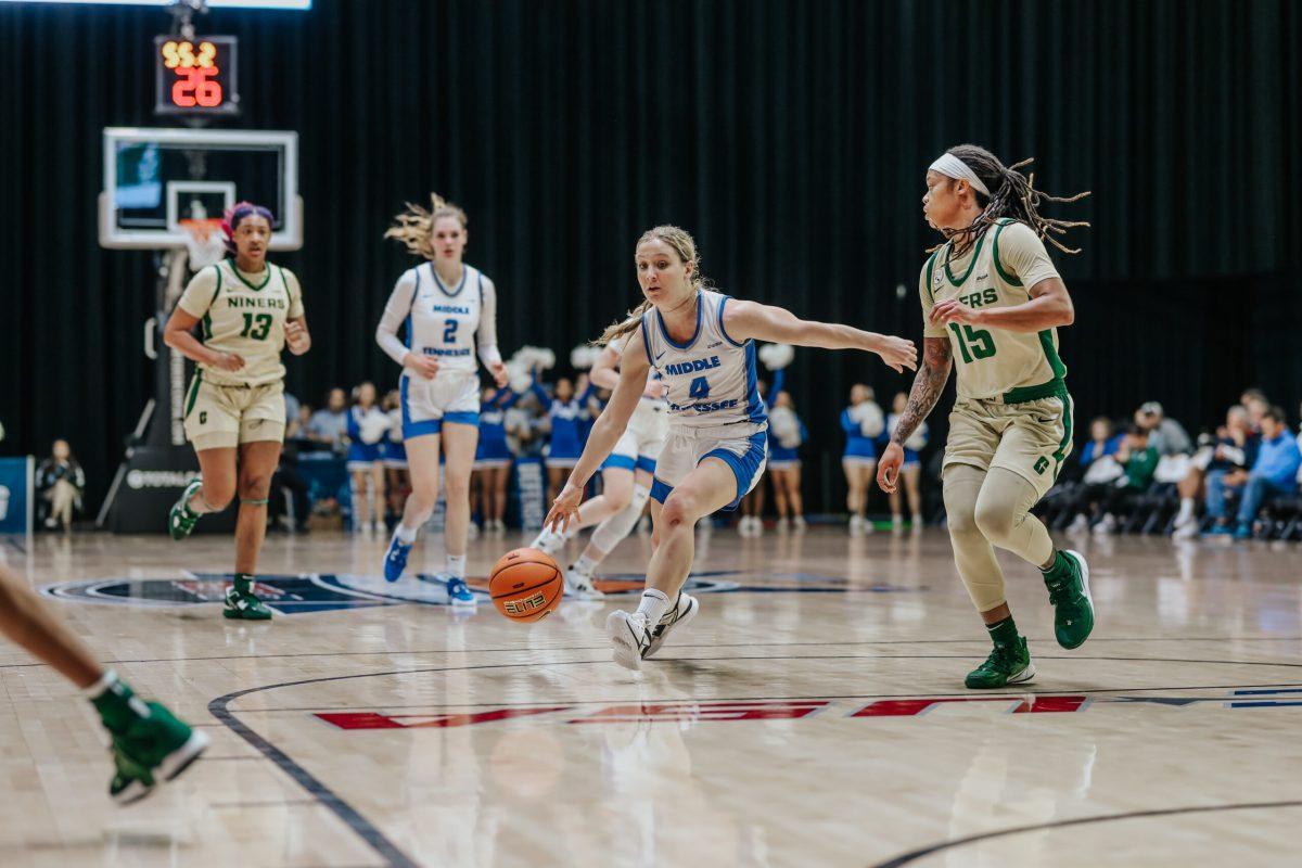 MTSU guard Savannah Wheeler drives to the basket against Charlotte in the quarterfinals of the 2023 Conference USA Tournament. (Photo by Matt Posey)