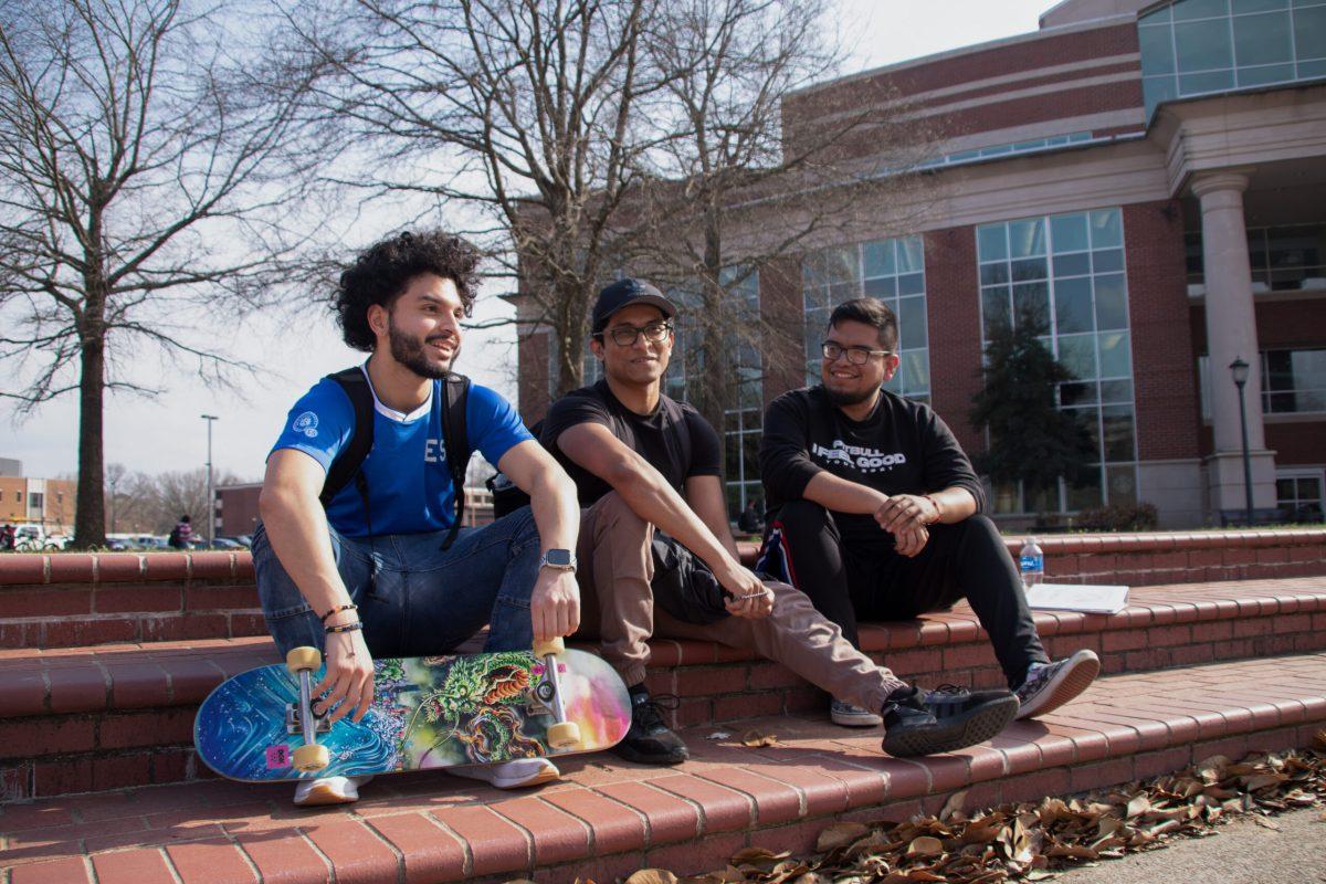 Ronald Zaragoza, Rodrigo Sierra and Sam Perez soaking up the rays in the quad. (Photo by Zoe Vecchio).