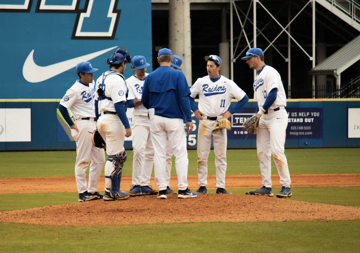 MTSU baseball gathers on the mound during a game. (Photo by Ryan Loftis)