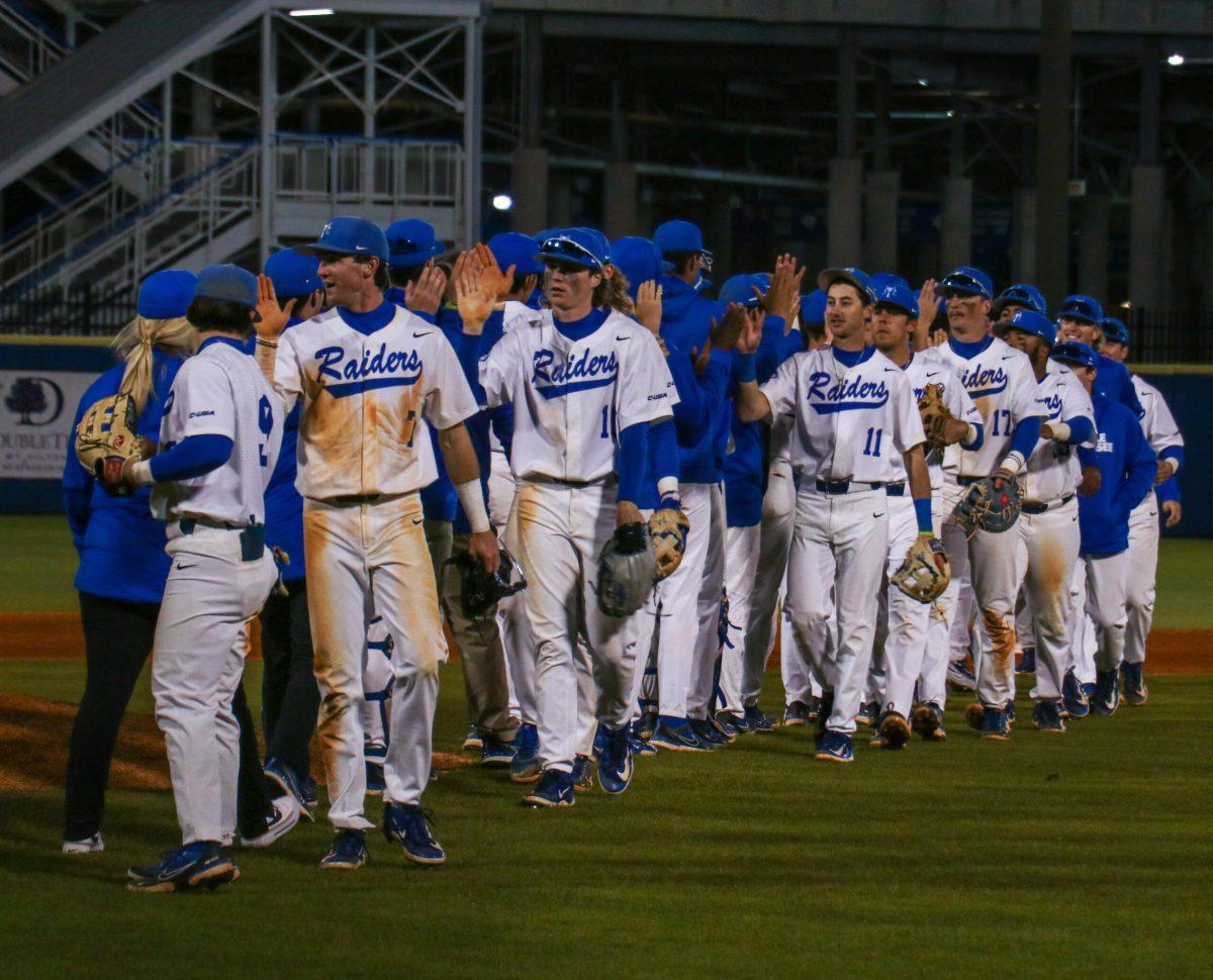 MTSU baseball shakes hands after the game. (Photo by Ryan Loftis)