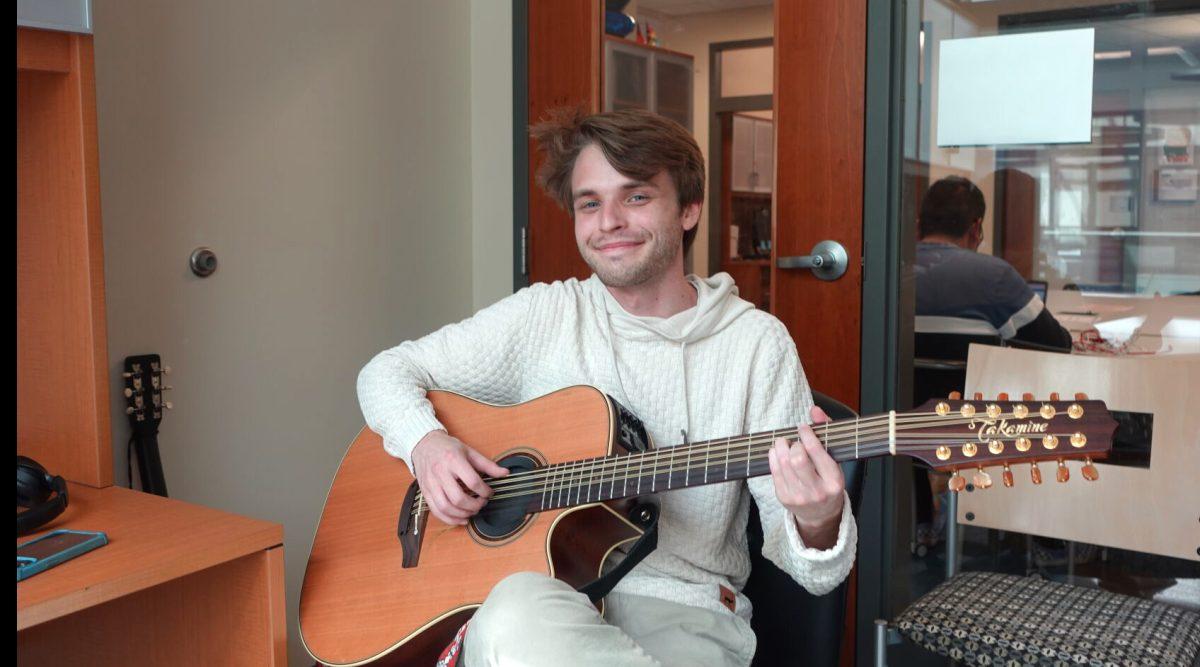 Evan Scandrett, an audio production major at MTSU, recently used an artificial intelligence tool, Chat GPT-4, to write a song. He was impressed, for the most part. Photo by Isabella Gutierrez