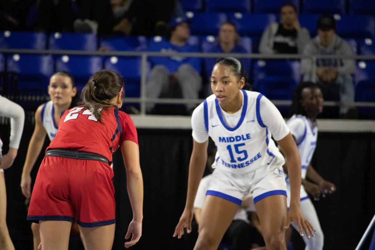 Ta'Mia Scott guards her opponent. (Photo by Preston Todd)